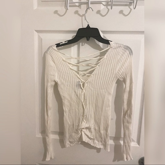 White long sleeve ribbed top with a lace up back from Fashion Nova - Picture 2 of 2